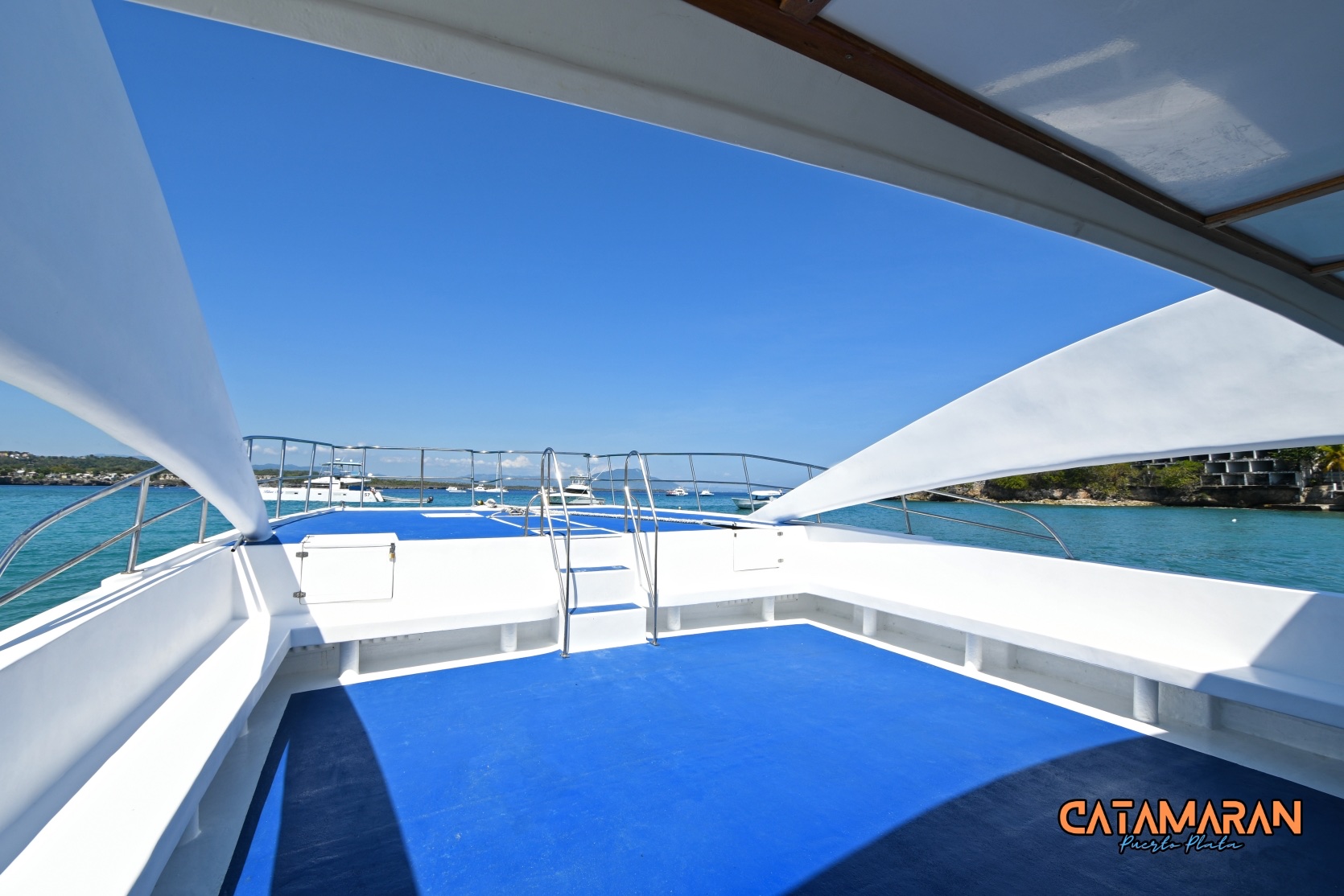 Large deck of the catamaran, fit for dance parties