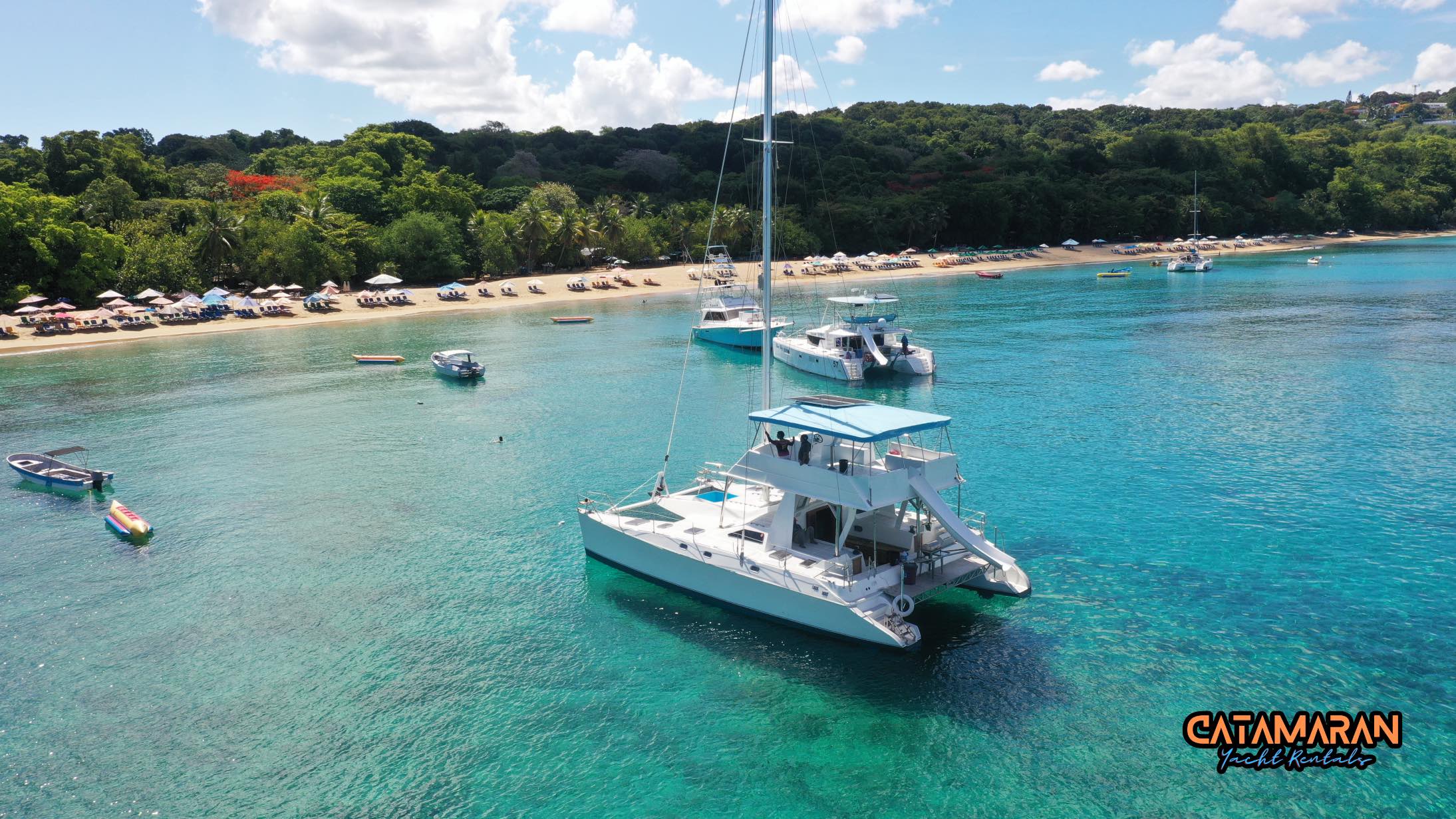 View of Sosua Beach beyond the catamaran