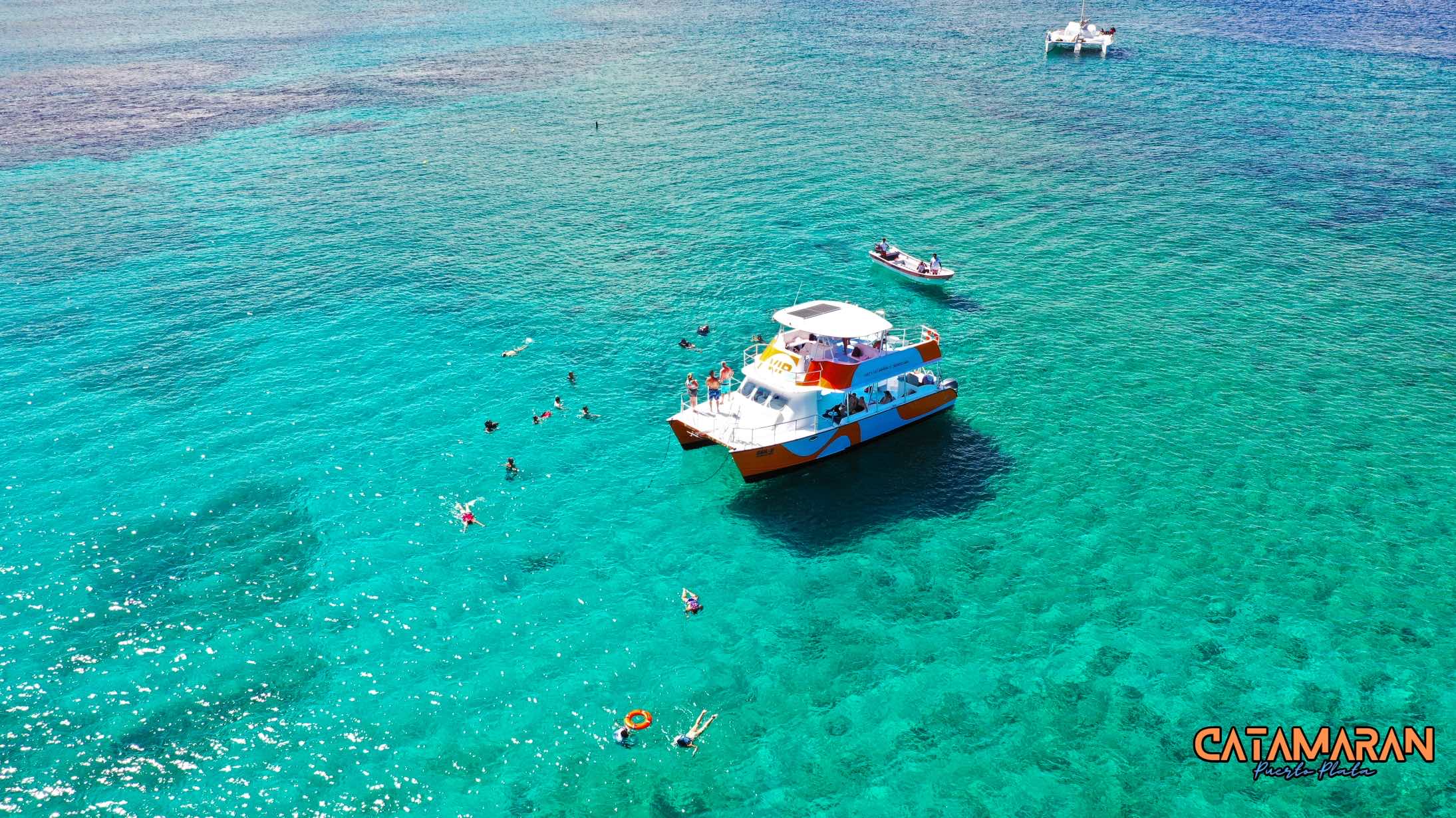 Aerial view of the charter on a Sunday with tourists from Amber Cove port.